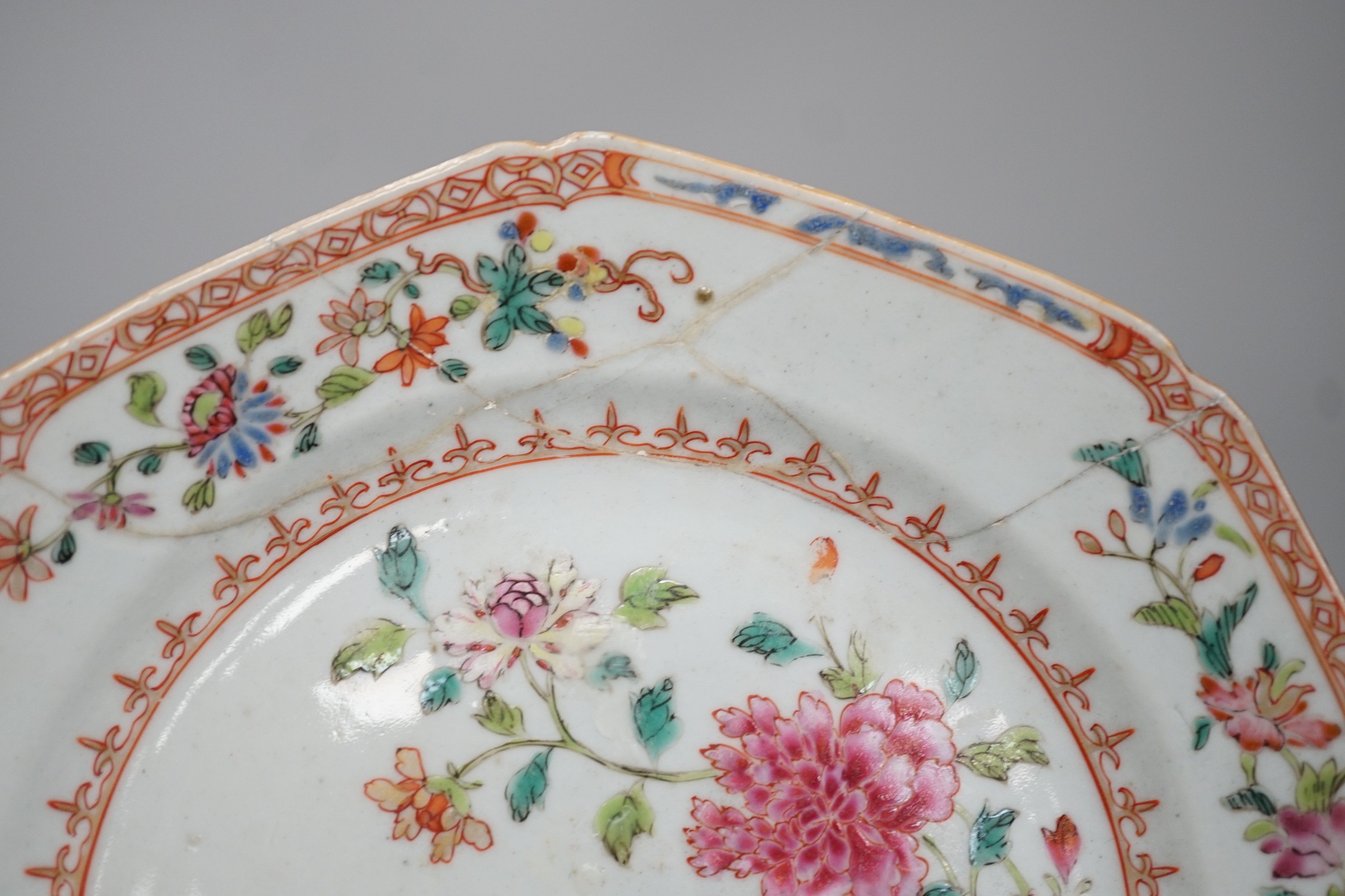 A Chinese figure of blanc de chine, a dragon tea bowl, a saucer, a large tankard, and another Chinese dish, tallest 23cm